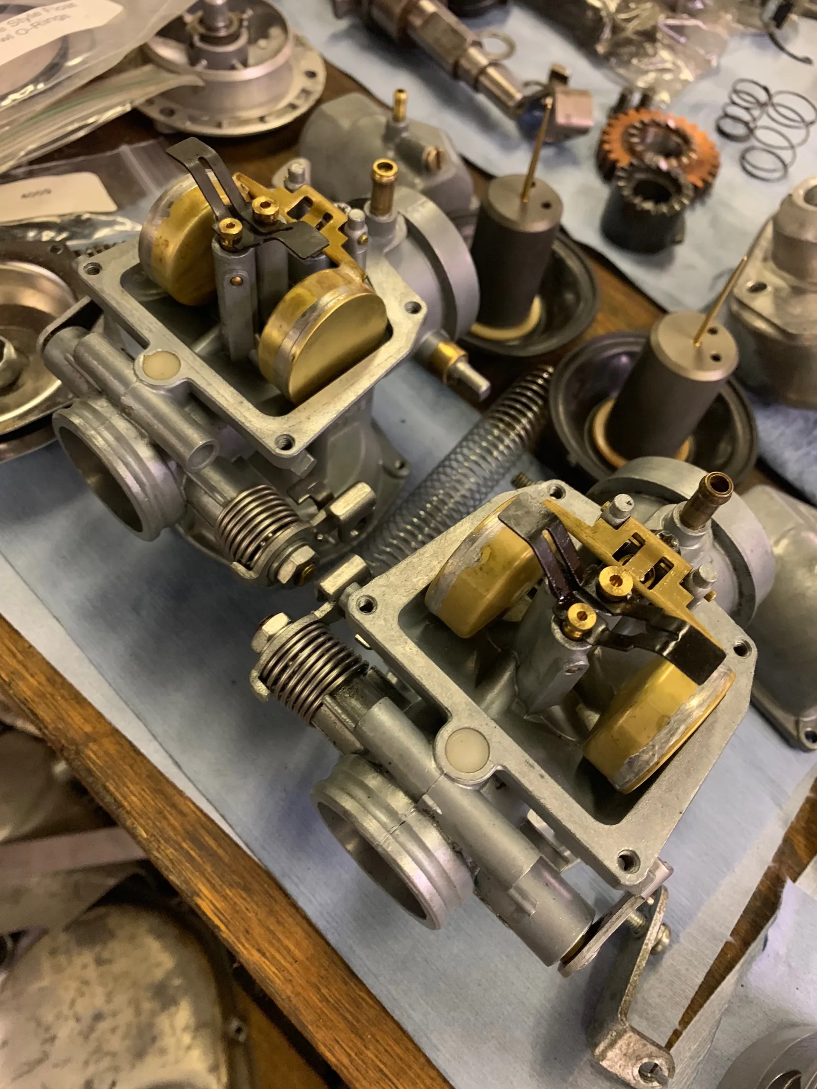 The pair of rebuilt carburetors with their original brass floats