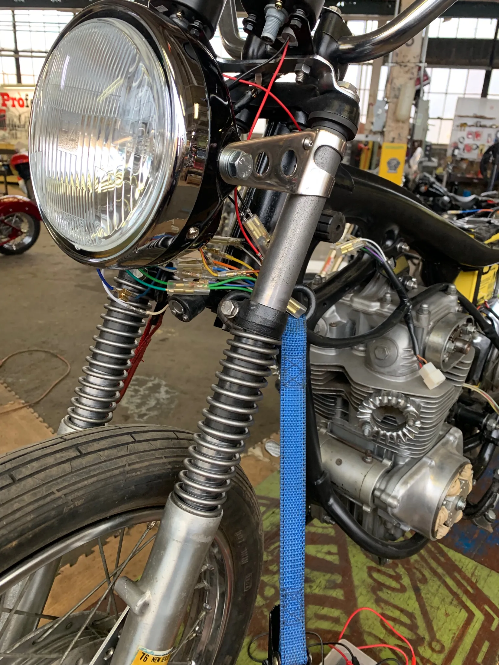 Headlight and front forks with the new wiring harness