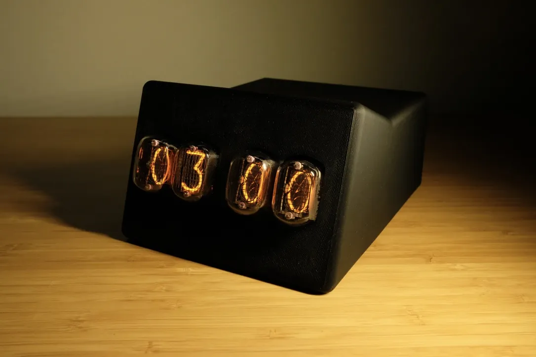 The clock from the left, glowing tubes set into the sloped front